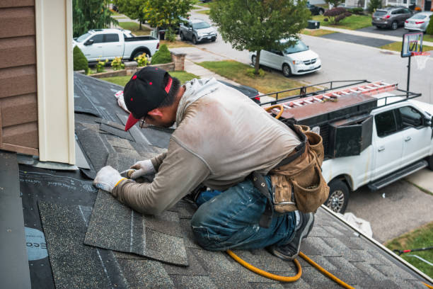 Professional Roofing technician working in Stockton, CA